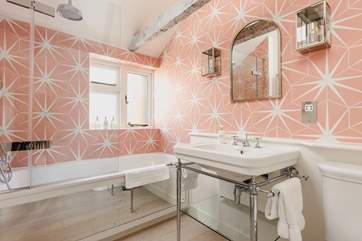 En suite to bedroom one - lie back and unwind in a hot bath.