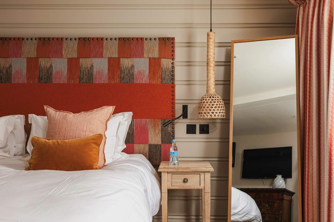 Colourful and cosy bedroom one.