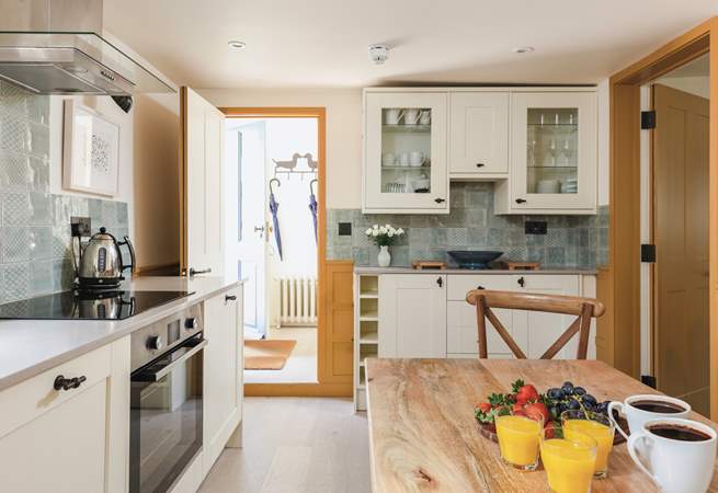 The superb kitchen, leading to the entrance hall and ground floor cloakroom - perfectly placed after any wet weather excursions.