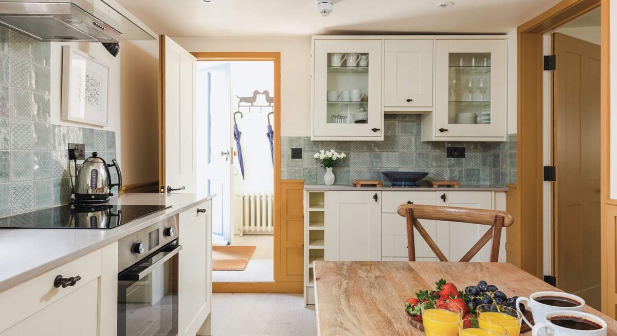 The superb kitchen, leading to the entrance hall and ground floor cloakroom - perfectly placed after any wet weather excursions.