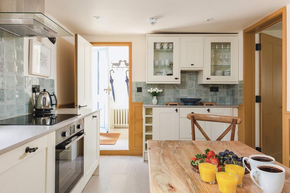The superb kitchen, leading to the entrance hall and ground floor cloakroom - perfectly placed after any wet weather excursions.