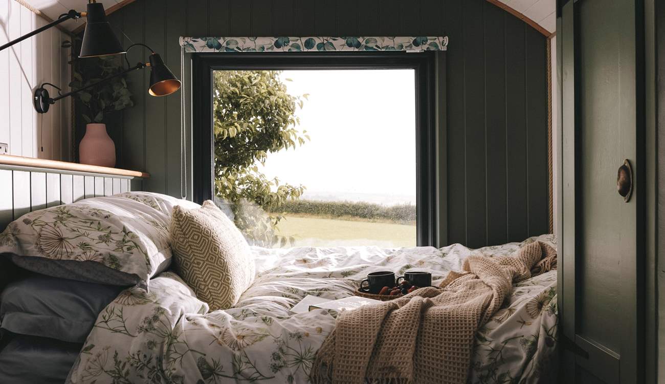 Adorned with luxury linens, the sumptuous king-size bed promises peaceful slumbers.