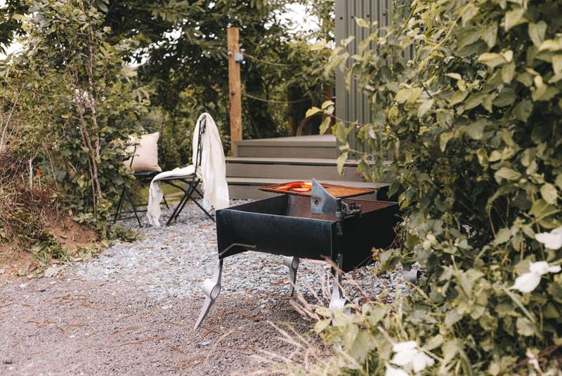 Sizzle up some local produce over the fire-pit, with a handy grill plate.