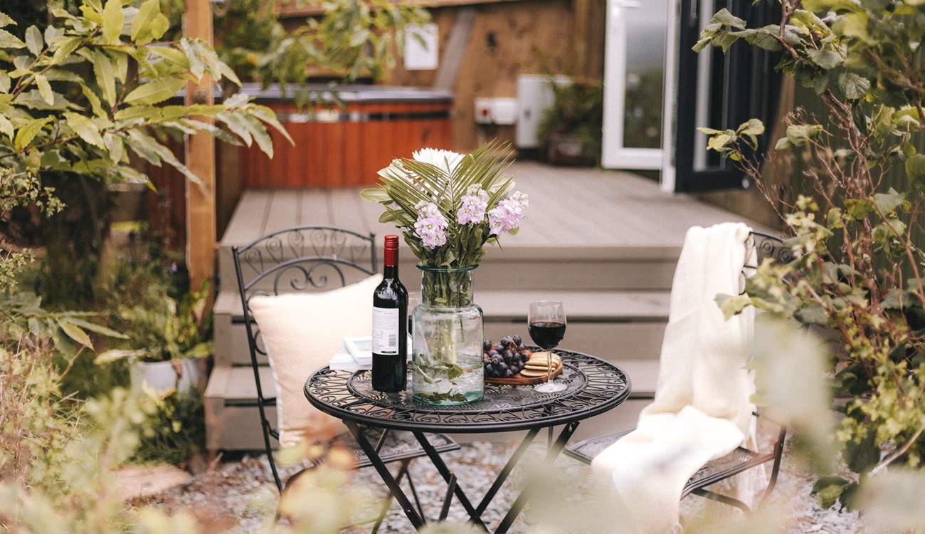 Dine amongst the trees with a soothing glass of red.