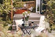 Dine amongst the trees with a soothing glass of red.