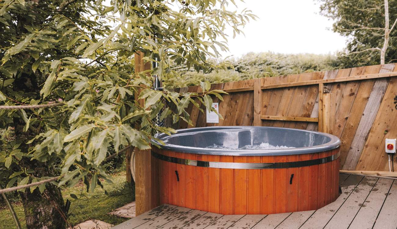 With a secluded wood-fired hot tub - a dreamy spot to unwind.