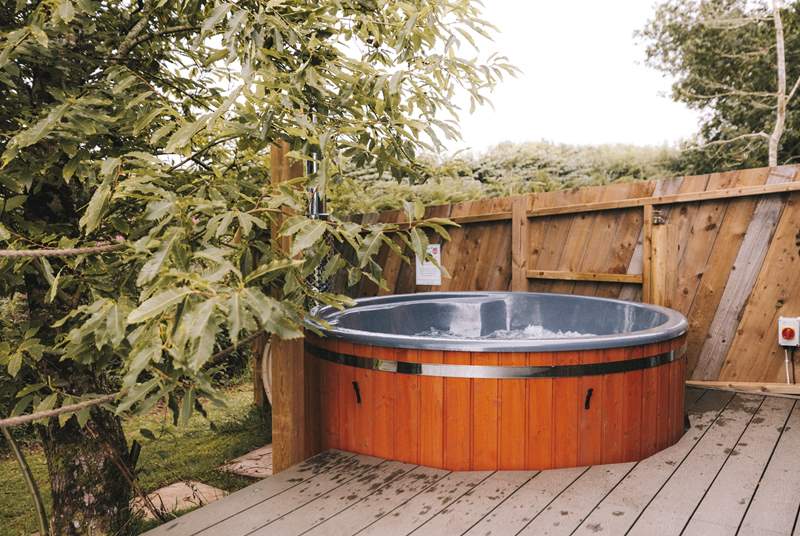 With a secluded wood-fired hot tub - a dreamy spot to unwind.