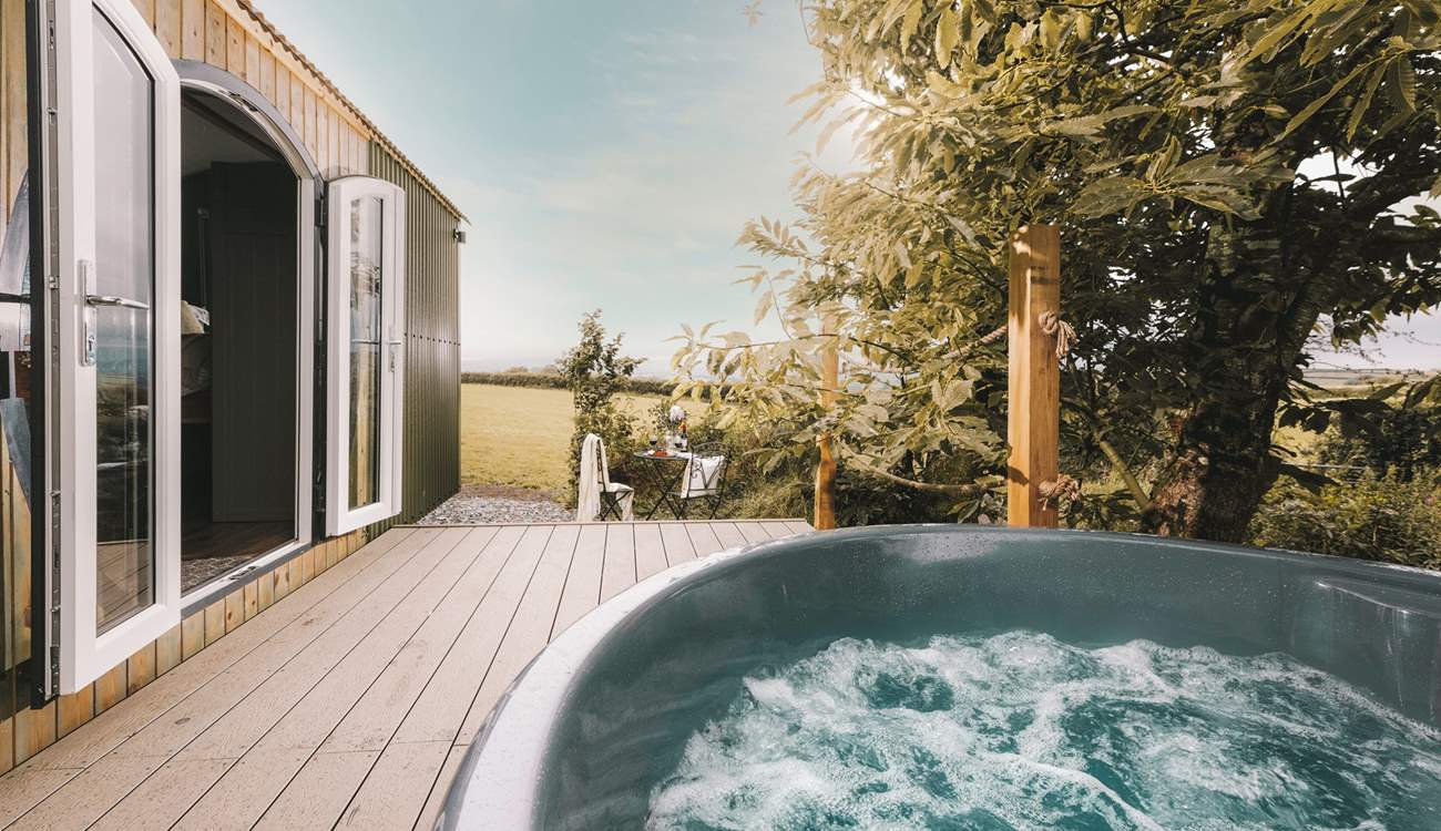 Relax in the bubbling hot tub. 