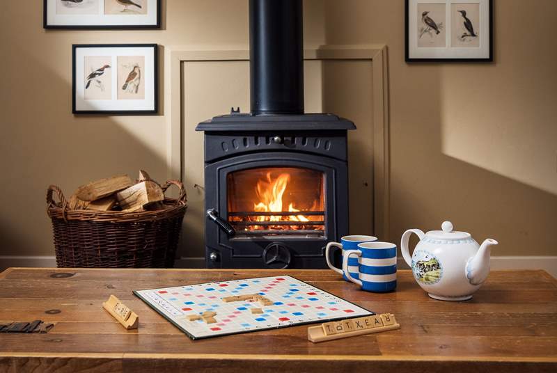 Snuggle up in front of the toasty wood-burner on chillier days.
