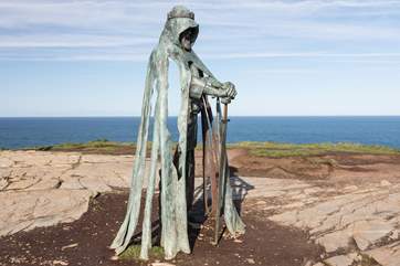 King Arthur standing proudly overlooking Tintagel.
