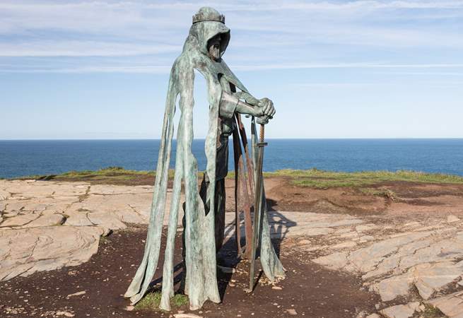 King Arthur standing proudly overlooking Tintagel.