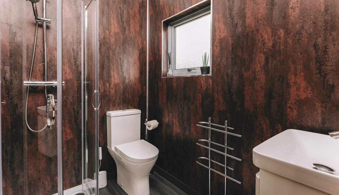 Freshen up in the beautifully presented shower-room. 