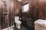 Freshen up in the beautifully presented shower-room.