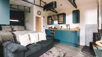 Bespoke features and sumptuous soft furnishings adorn the inside space. 