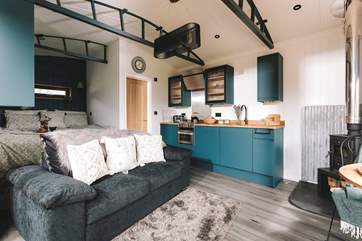 Bespoke features and sumptuous soft furnishings adorn the inside space.