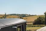 You'll find the hut perched atop a pretty meadow, settled within the gentle rolling hills of rural south Devon.