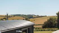 You'll find the hut perched atop a pretty meadow, settled within the gentle rolling hills of rural south Devon.