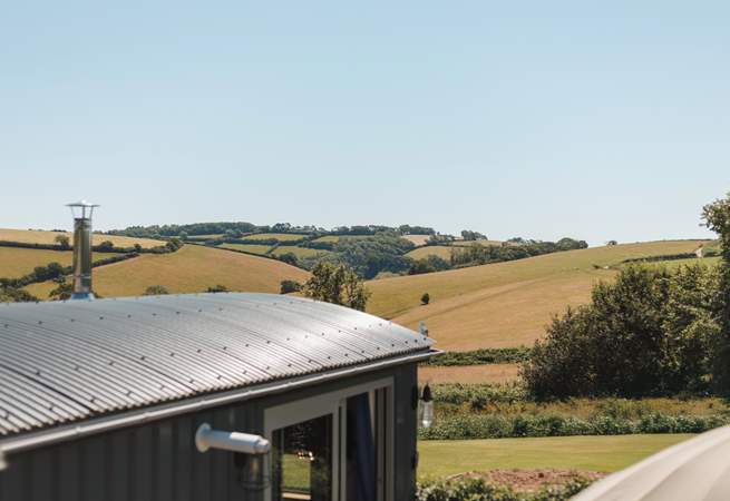 You'll find the hut perched atop a pretty meadow, settled within the gentle rolling hills of rural south Devon.