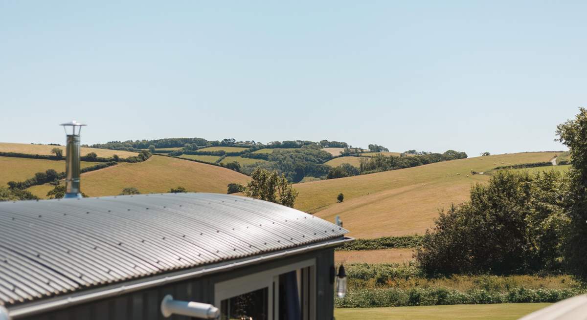 You'll find the hut perched atop a pretty meadow, settled within the gentle rolling hills of rural south Devon.