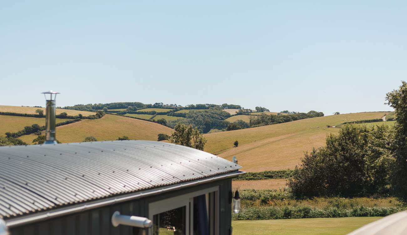 You'll find the hut perched atop a pretty meadow, settled within the gentle rolling hills of rural south Devon.