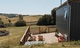 Please note Harvest Hut is positioned in a meadow with another hideaway and 5 caravan pitches, but you have your own area and privacy.  - Thumbnail Image