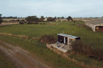 Settled on a working farm, with privacy promised and dreamy surroundings.
