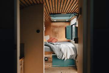 Make a wish upon the first star you see through the skylight above your luxurious king-sized bed.