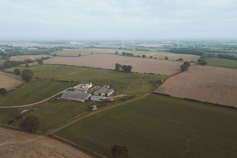You can see the working farm behind the cabin, set in the rolling fields of County Durham. Cinnabar Nest is in the field to the right, on the left is Raffer Yem another hideaway that sleeps two. 