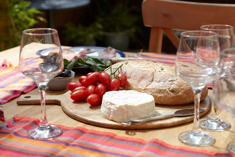 Enjoy local cheese, fresh tomatoes with island baked bread.