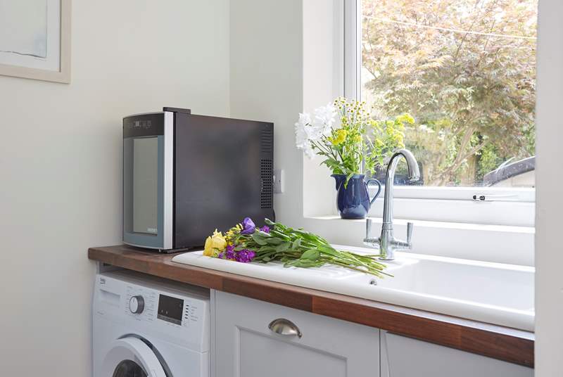 The utility area, with additional sink, ideal for preparing a vase of flowers.
