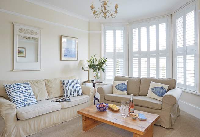 Relax and unwind in the comfy sitting-room which is spacious and full of light.