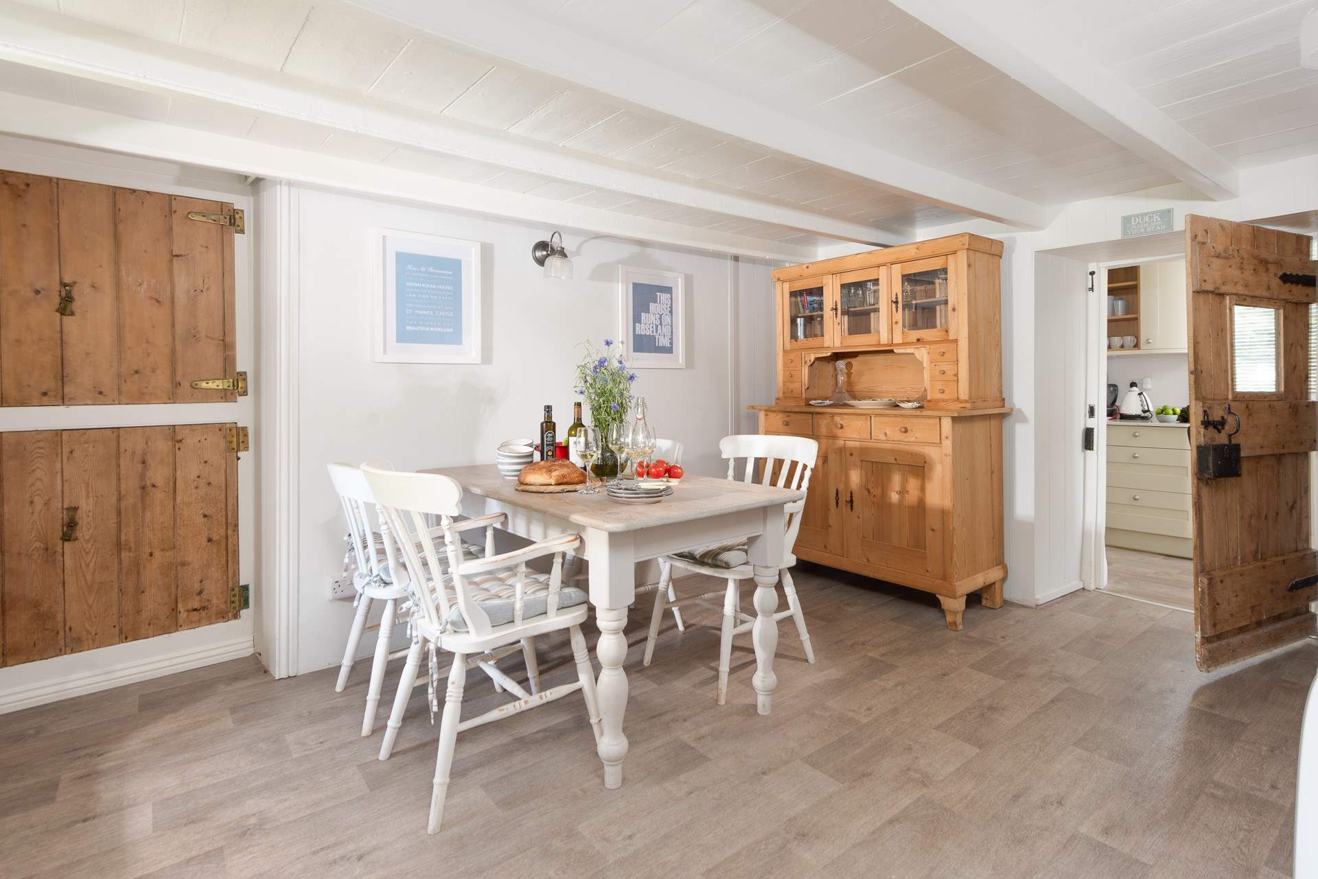 The dining-room leads through to the kitchen.