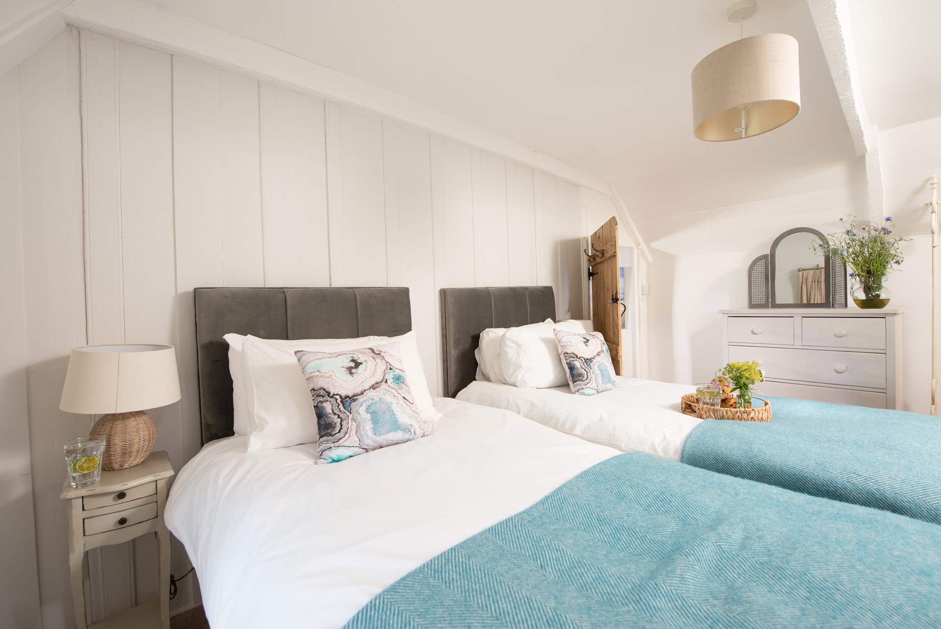 Calm colours and quality furnishings ensure a comfortable stay at this lovely cottage.