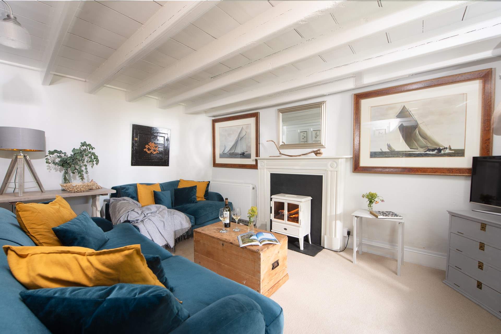 The electric fire creates a warming glow in the evening and a boost of warmth if it turns chilly.