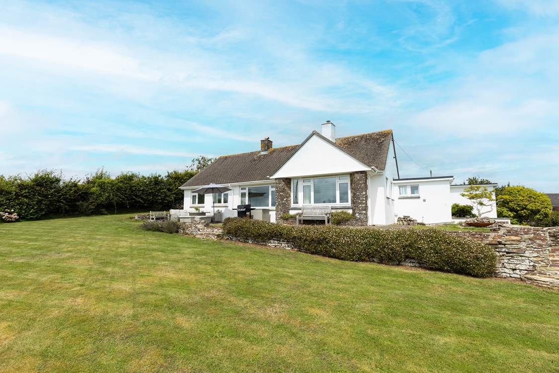 The spacious gardens are perfect for children and the family dog to play.