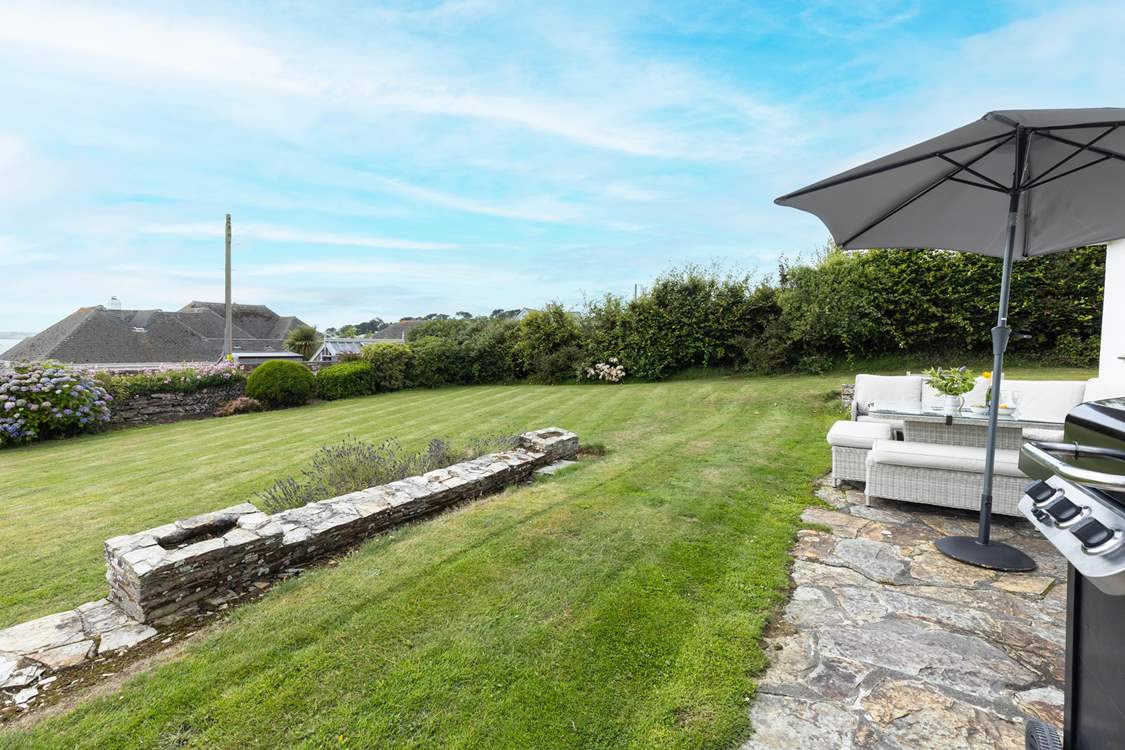 The house is on a hill so the garden gently slopes.