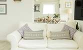 Relax on the comfy sofas.  - Thumbnail Image