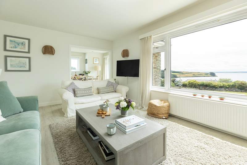 The open plan living-room has stunning views across the Carrick Roads. 