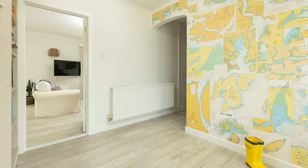 The feature wallpaper in the entrance hall will help you navigate Cornwall. 