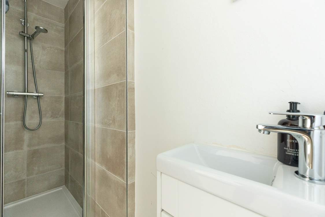 There are two steps to the handy shower-room.