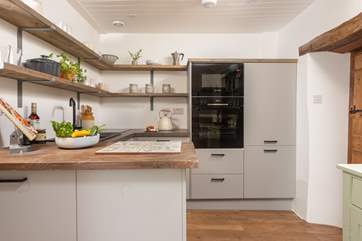 Prepare your holiday meals in the delightful kitchen.