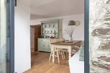 The bi-fold doors really let the light flood into the dining-area.