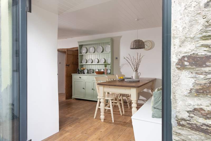 The bi-fold doors really let the light flood into the dining-area.