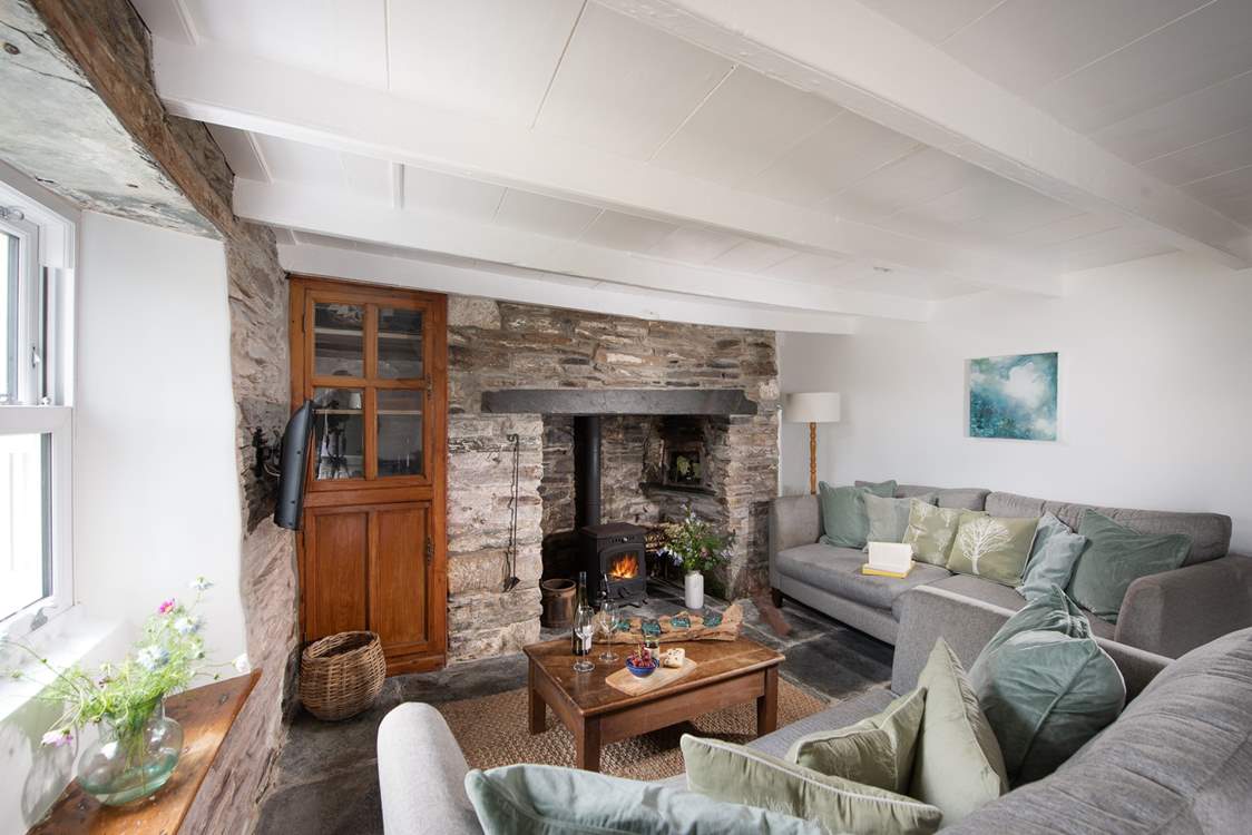 Cosy up in the cottage sitting-room.