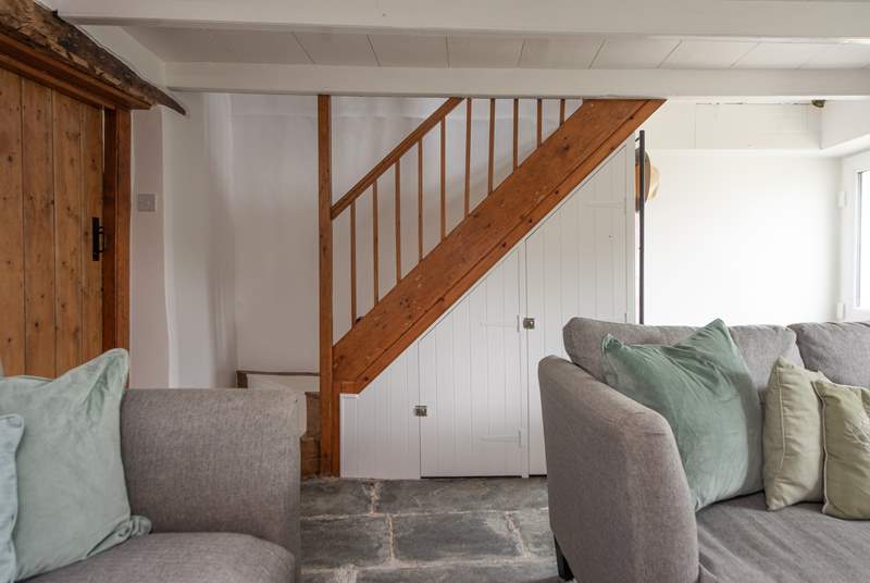 The stairs lead up from the sitting-room to bedroom 1.
