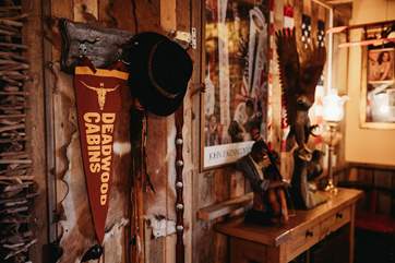 The owners have collected memorabilia from their travels around America which are displayed within the cabin.