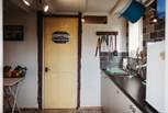 You'll find the shower-room just next to the kitchen. 