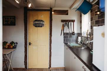 You'll find the shower-room just next to the kitchen.