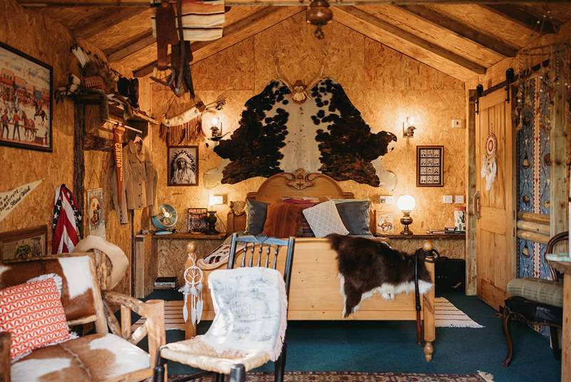 The owners' passion for the Wild West is evident throughout this bespoke log cabin. 