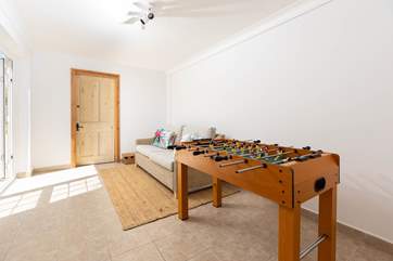 Table football! There is also a croquet set stored here for use in the garden.